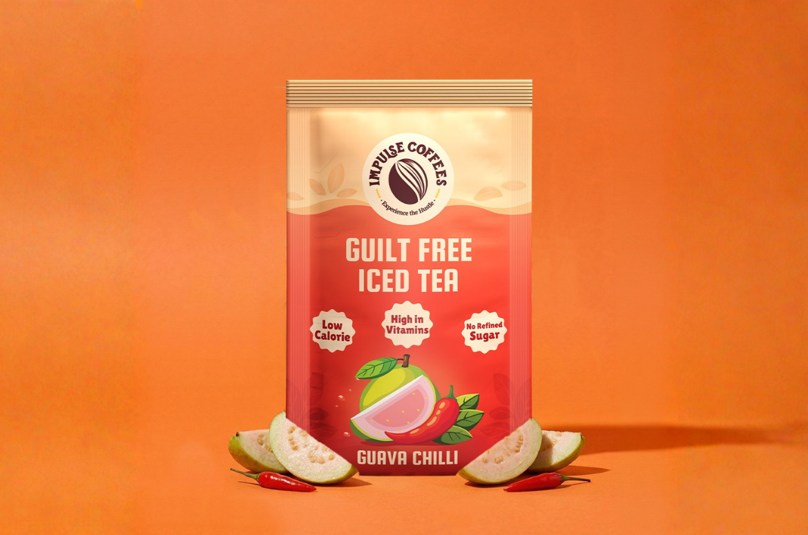 Impulse Coffees Guava Chilli Guilt Free Iced Tea pouch surrounded by fresh guava slices and red chilies on a vibrant orange studio background.