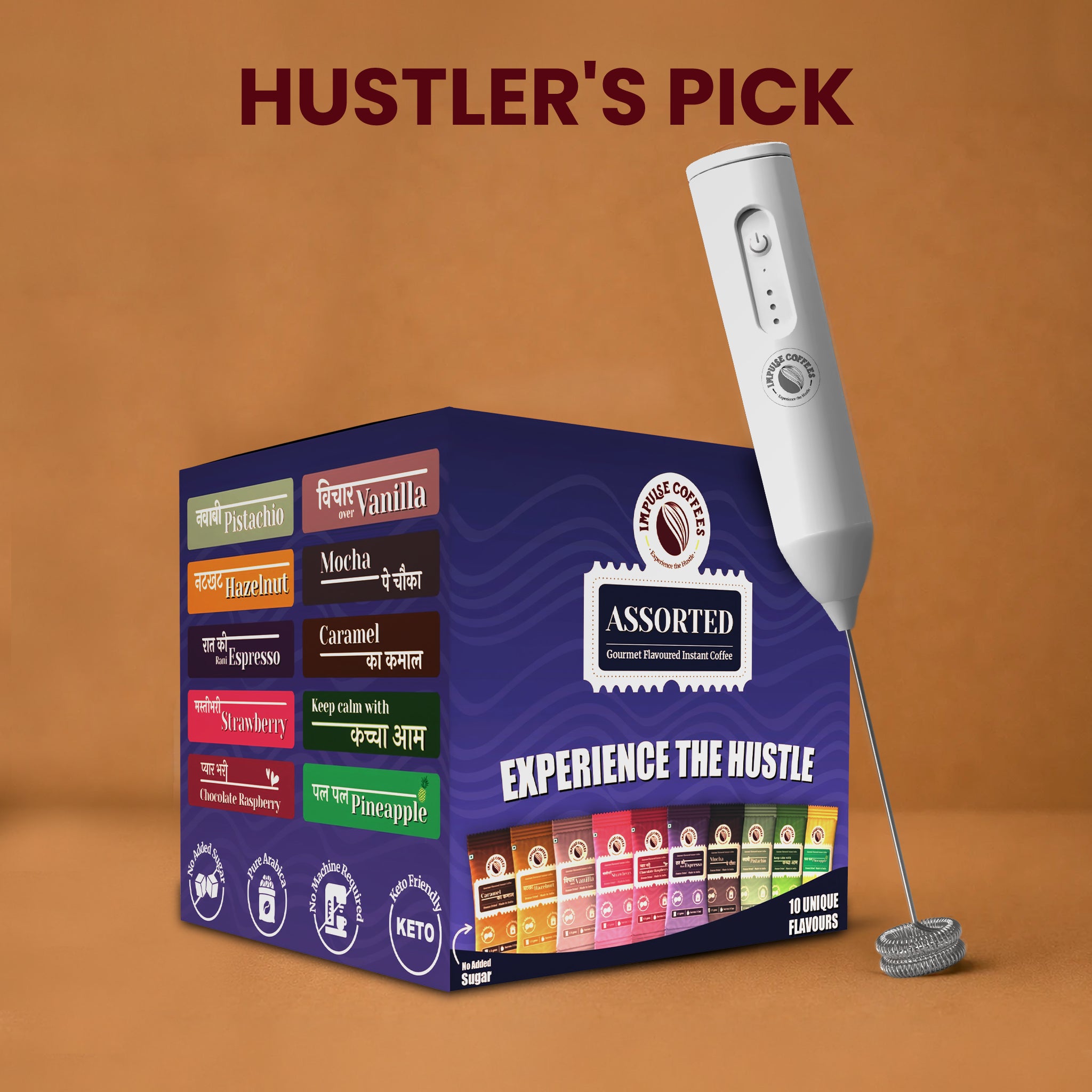 Impulse Coffees Hustler's Pick travel bundle showcasing a deep blue box of Assorted Gourmet Flavoured Instant Coffee with 10 unique sachet flavours next to a standing white electronic rechargeable milk frother against a warm brown studio background.