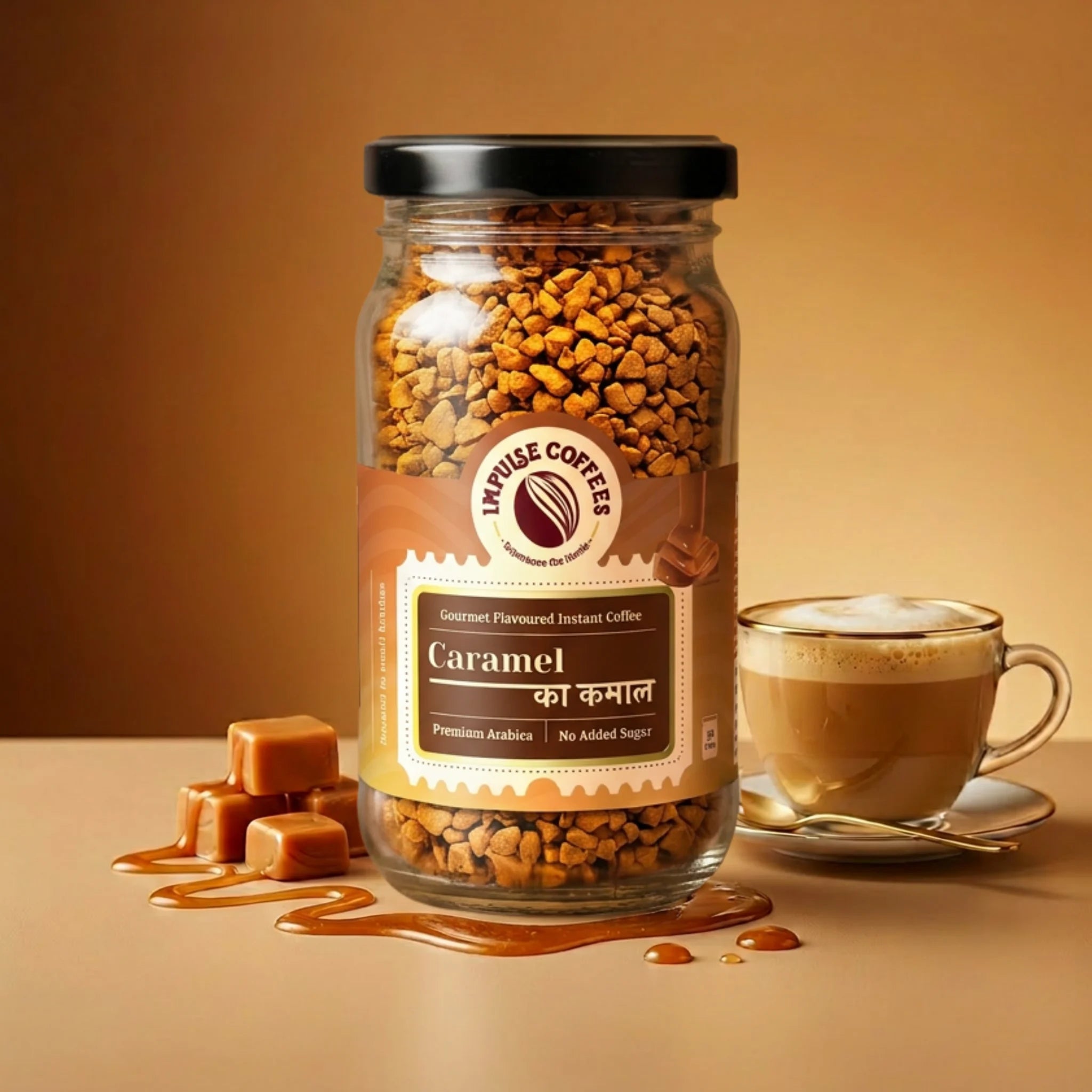 Impulse Coffees Caramel Ka Kamal flavored instant coffee 50g jar on a rich brown backdrop, surrounded by floating caramel cubes, swirling liquid caramel drizzles, and roasted coffee beans.