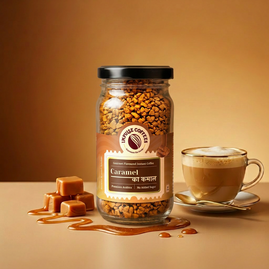 Impulse Coffees Caramel Ka Kamal flavored instant coffee 50g jar on a rich brown backdrop, surrounded by floating caramel cubes, swirling liquid caramel drizzles, and roasted coffee beans.