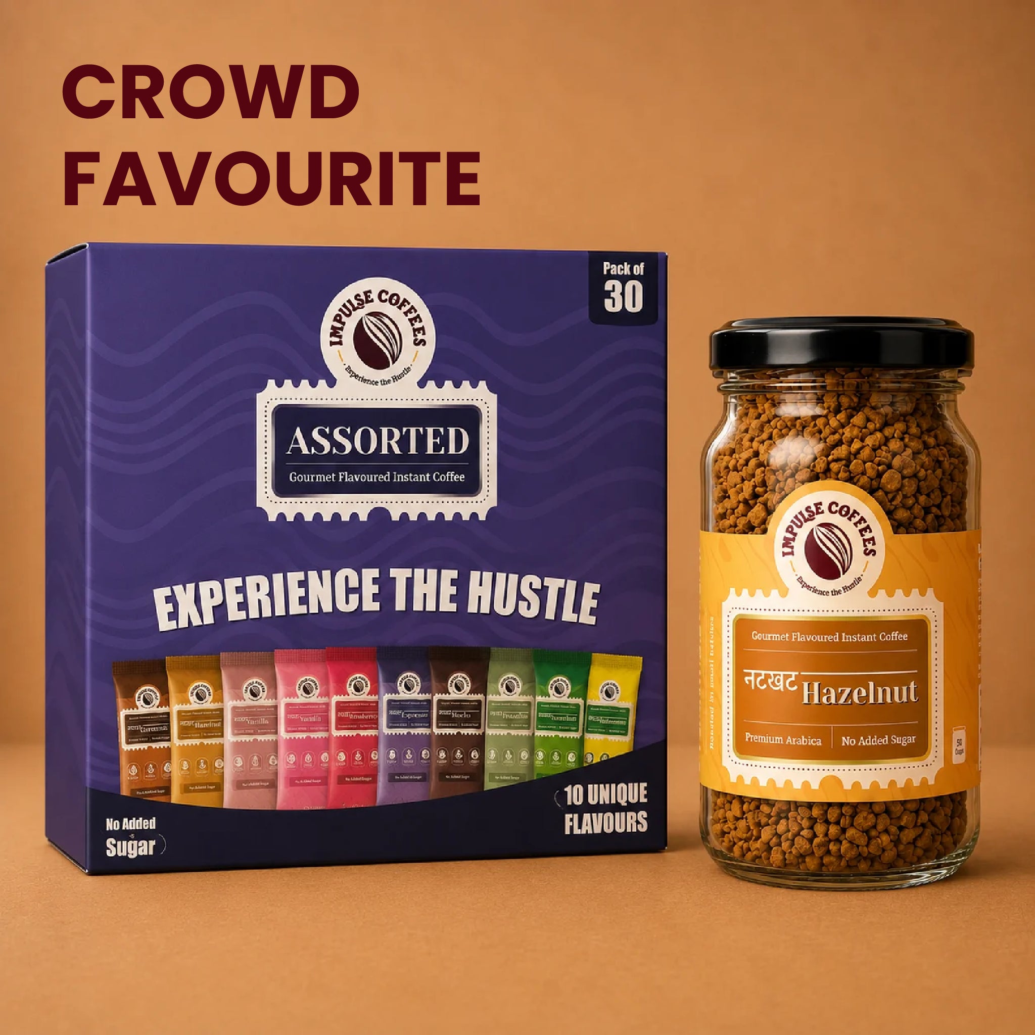 Impulse Coffees Hazelnut Ki Shararat Combo bundle featuring a glass jar of Nutkhat Hazelnut gourmet flavoured instant coffee standing next to a purple box of 30 assorted sachet packs containing 10 unique coffee flavours.