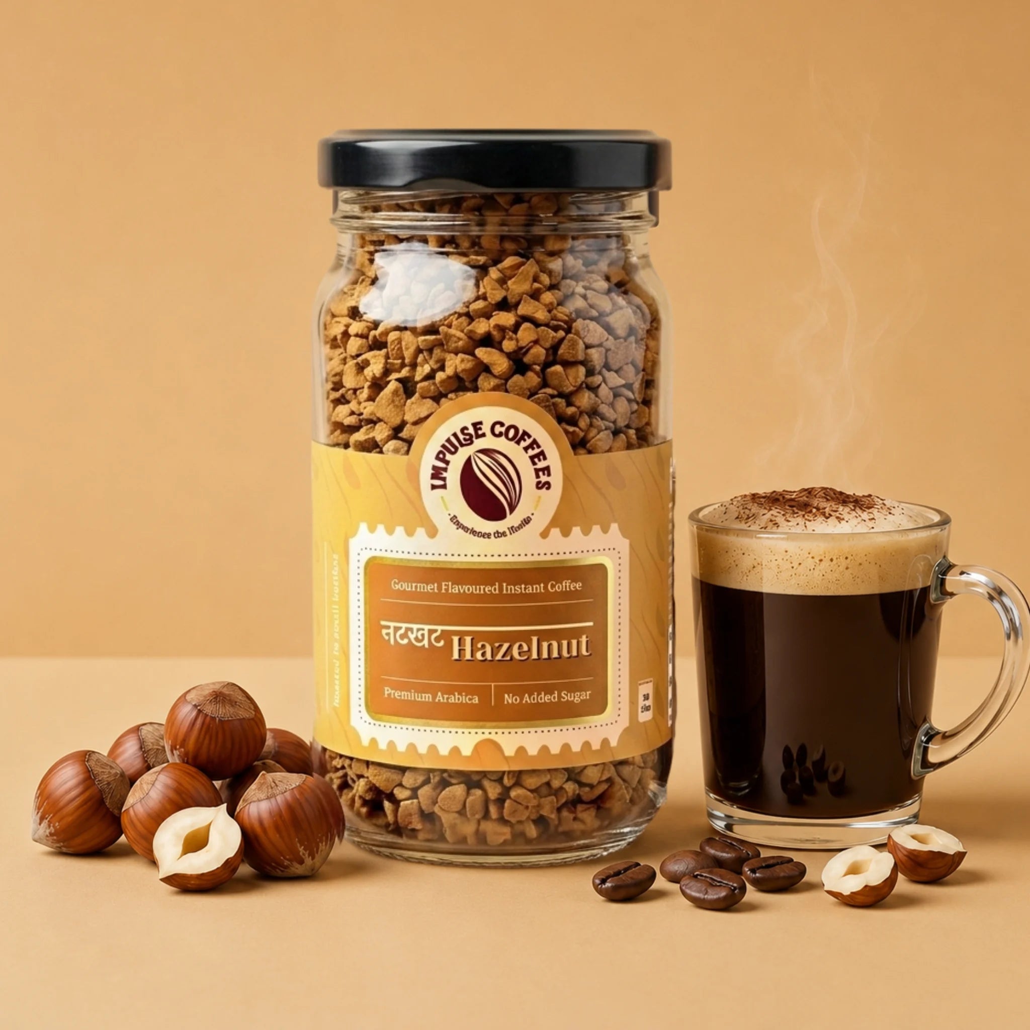 Impulse Coffees Nutkhat Hazelnut flavored instant coffee 50g jar on a warm tan backdrop, surrounded by floating whole hazelnuts, shelled hazelnut pieces, and roasted coffee beans.