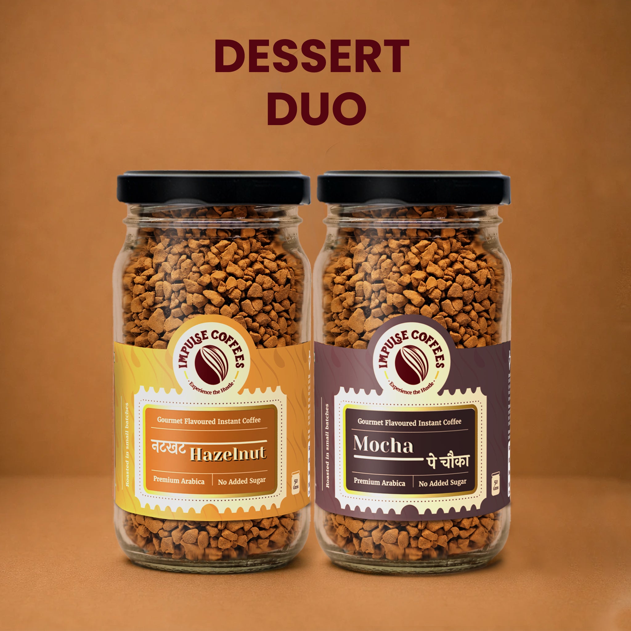 Impulse Coffees Nutty Coffee Combo product bundle featuring two glass jars standing side-by-side on a warm brown background: Nutkhat Hazelnut and Vichaar Over Vanilla gourmet flavoured instant coffee.