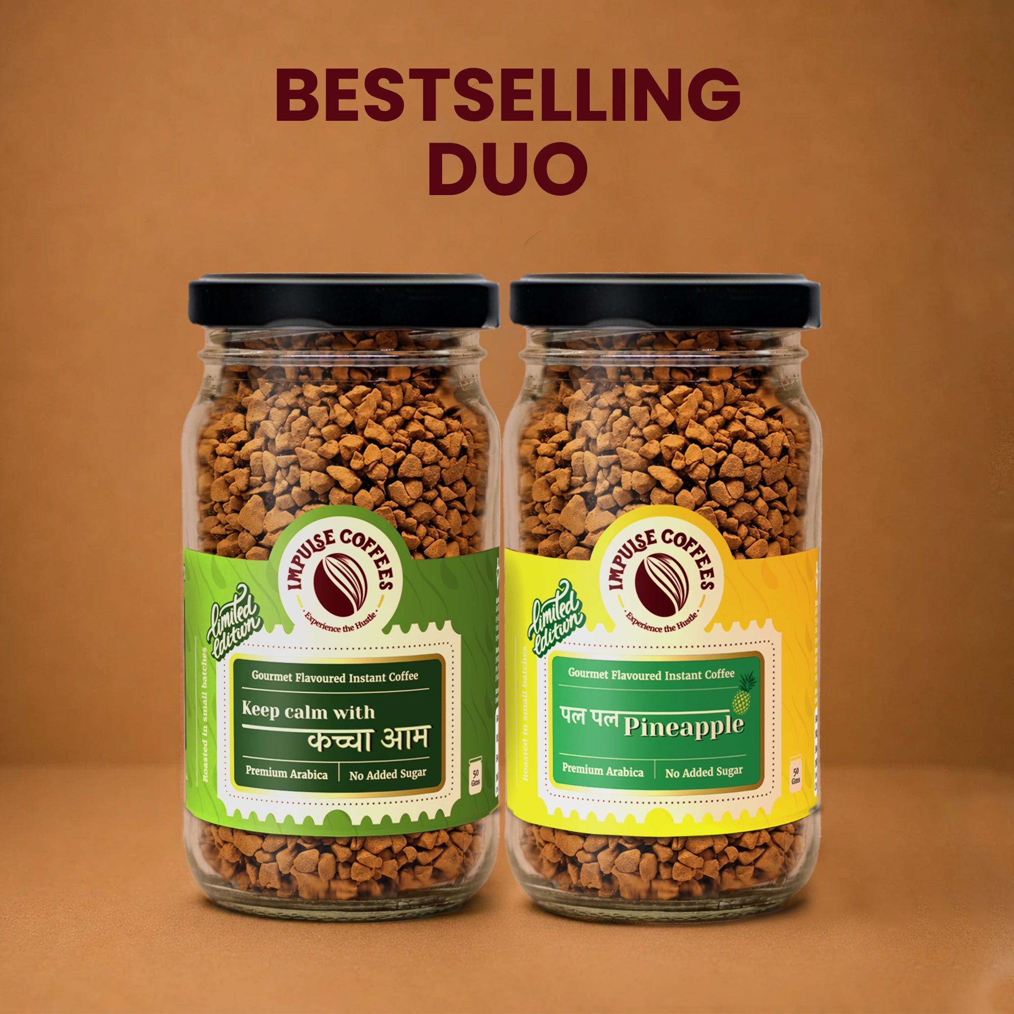 Impulse Coffees Summer Surprise Duo product bundle featuring two glass jars standing side-by-side on a warm brown background: Pal Pal Pineapple and Keep Calm With Kachcha Aam unique fruit flavoured instant coffee.